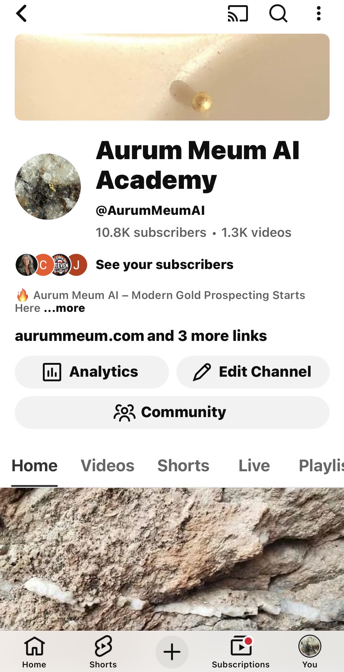 Screenshot of the Aurum Meum AI Academy YouTube channel showing over 10.8K subscribers and more than 1.3K videos focused on AI-powered gold prospecting and geology education.